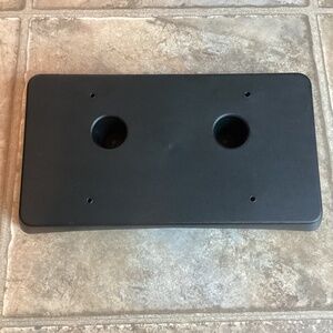 Genuine GM Manufacturer Front License Plate Holder Part Number 42443602